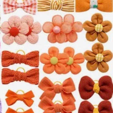 ASSORTED ORANGE BOWS - 22 BOWS